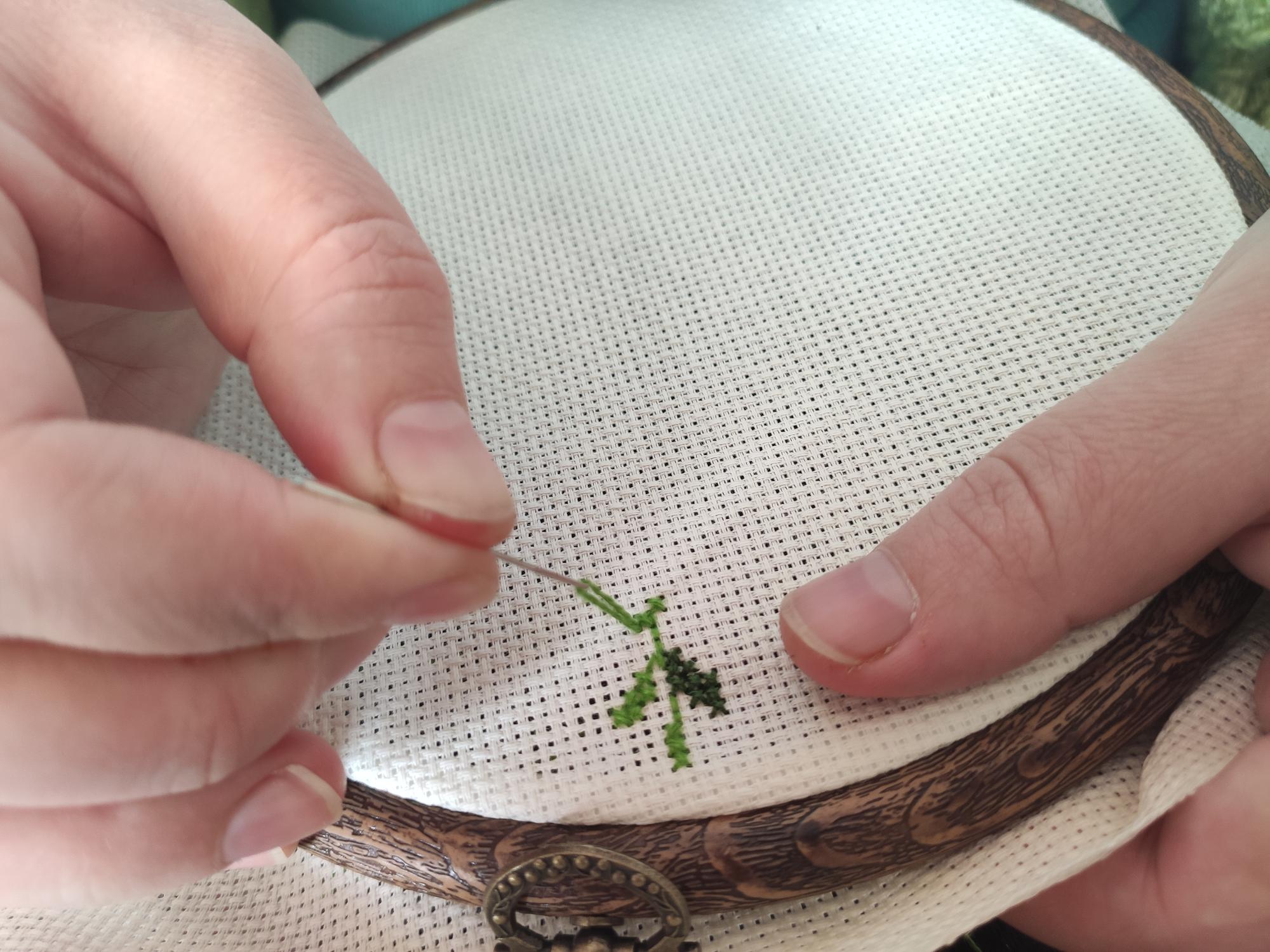close-up hand embroidery on linen